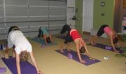 Image of people practicing autumn yoga poses 