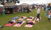 Green Day Out 2011 kids practing yoga at the markets near the river.