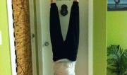 Martine Ford of Spirit Yoga handstand under sign 'don't forget to breathe'