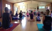 students sitting on yoga mats for a Yin Class at Yin/Yang Retreat by Yoga Shala