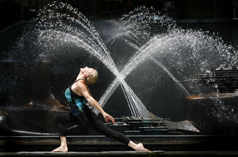 Open to Receive - Martine Ford of Spirit Yoga by a fountain